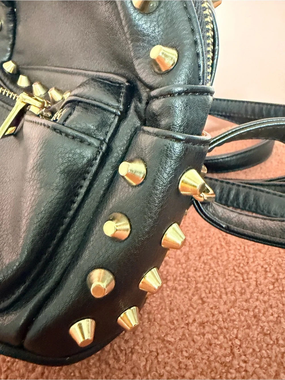 Mini rock n’ roll studded backpack. Vegan leather. Very roomie inside!!